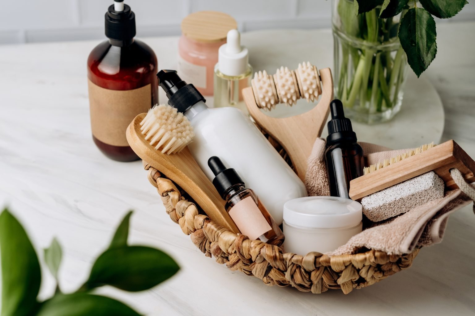 Bottles shampoo or shower gel Lotion, serum or essential oil, cream, massage brushes for skincare, Body and face care beauty bath set,